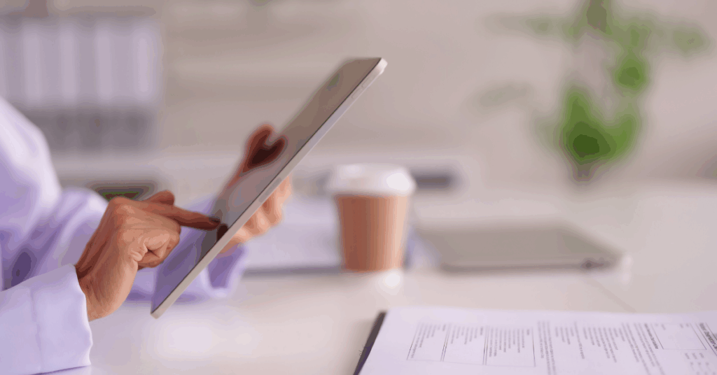 Healthcare professional reviewing patient data on a tablet – AI integration workflows