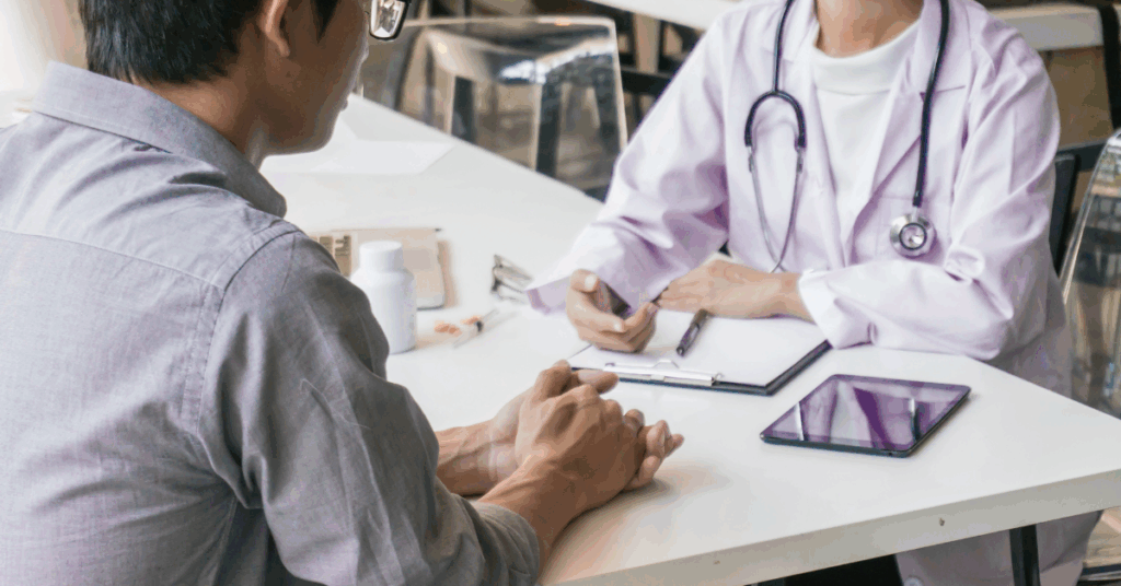 Patient consult at a clinic – RCM integration in healthcare streamlining prior authorization, eligibility checks, and denials handling.